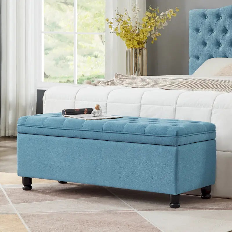 Banc de rangement capitonné en tissu de lin avec pieds fuselés en bois