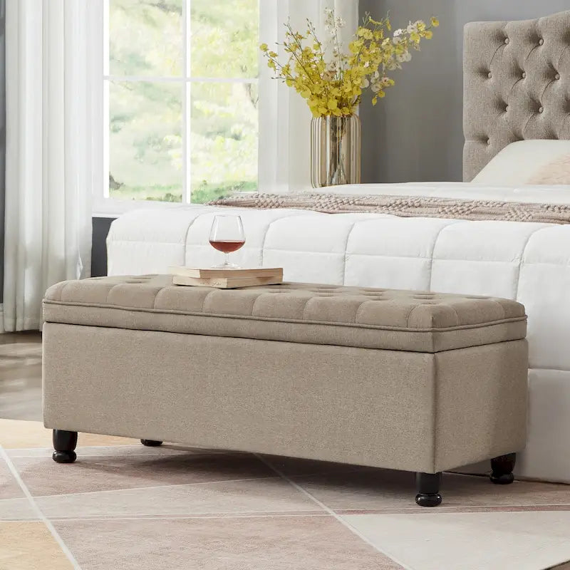 Banc de rangement capitonné en tissu de lin avec pieds fuselés en bois